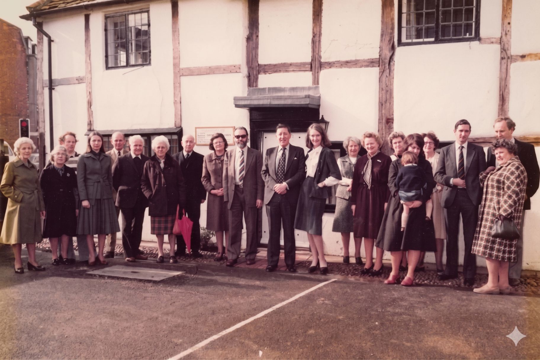 The Gardiner's team gathered outside our Caversham office in the 1980s — the same office we work from today