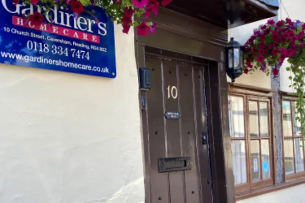 The front door of our Church Street office in Caversham, with the Gardiner's Homecare sign above