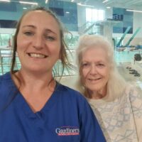 Client and Care Worker at the Swimming pool