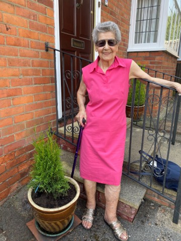 Nina with her newly planted conifer